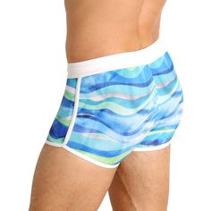 Based on an American classic, LASC's square-cut swim trunk will never go out of style. Made of a soft, stretchy and quick-drying performance fabric, this trunk features a unique print, front lining, contrast trim and exposed drawstrings to keep everything in place as you swim or dive. Although retro-inspired, LASC's trunk brings you up-to-date with today's popular shorter leg length. Designer Features: All-over print; contrast trim Size and Fit: Model is wearing a size Small; Model is 6 ft 1 in, Fitted Blue Boxer Briefs With Built-in Shorts, Blue Boxer Briefs With Built-in Shorts For Beach Season, Blue Sporty Boxer Briefs For Beach, Blue Stretch Boxer Briefs For Beach Season, Summer Fitted Blue Boxer Briefs, Blue Fitted Boxer Briefs For Summer, Fitted Blue Boxer Briefs For Summer, Fitted Boxer Briefs For Surfing And Beach Season, Blue Fitted Surfing Shorts