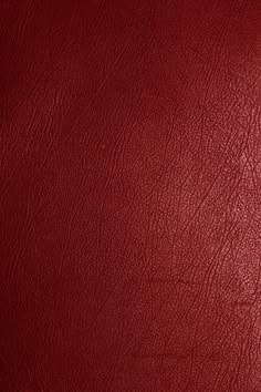 a red leather texture background or wallpaper