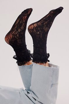 Just as effortless as they are essential, these so cool socks are featured in a mid-calf rise and sheer lace fabrication with ruffled top trim for a special finishing touch. **Features:** Sheer mesh lace fabrication, defined rifle detail at top, scrunch-able style **Why We ❤ It:** The ideal blend of sweet and sultry, these go-with-anything socks are sure to make the perfect subtle touch when paired with absolutely any style. | Embrace Lace Tall Socks by Free People in Black Net Socks, Coquette Clothing, Ruffle Socks, Tall Socks, Ruffled Socks, Mesh Socks, Fluffy Socks, Sheer Socks, 2024 Style