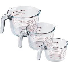 three measuring cups sitting next to each other