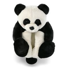 a black and white stuffed panda bear sitting down