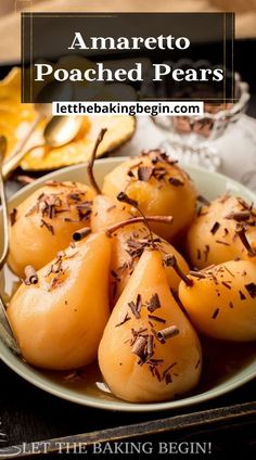 some pears are sitting on a plate with the words amarettoo poached pears