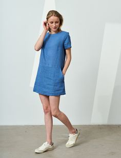 "60s style mini linen dress with short sleeves. The 60s fashion has been missed a lot and made a massive comeback. This retro linen dress features key accents of the style like a crew neck, straight cut and mini length. No doubt, such short dress is a perfect companion for hot summer days. In cooler weather we suggest wearing it over pants as a stylish linen tunic of the 60s. Side pockets add extra convenience. This linen tunic is made from medium-weight fabric but also available in heavy-weight Summer Dresses With Pockets And Crew Neck, Casual Mini Dress With Pockets And Short Sleeves, Summer Dresses With Crew Neck And Side Pockets, Short Sleeve Linen Dress With Pockets For Summer, Summer Dresses With Side Pockets And Crew Neck, Spring Crew Neck Dress With Side Pockets, Summer Crew Neck Dresses With Side Pockets, Short Sleeve Mini Dress With Pockets In Relaxed Fit, Relaxed Fit Mini Dress With Pockets And Short Sleeves