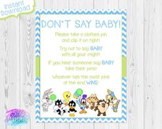 a baby shower sign that says, don't say baby and has cartoon characters on it