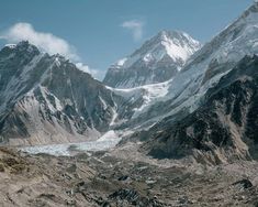 the mountains are covered in snow and ice