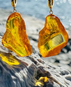 Earrings material and details : * Stone: Natural Baltic Amber * Metal: 24K Gold-plated Sterling silver * Silver hallmark :Ag 925 * Weight: 11,0 g * Earrings length : 5,5 cm * Colour : Honey Amber Dangle Earrings In Baltic Amber, Orange Citrine Earrings Gift, Unique Yellow Baltic Amber Jewelry, Amber Dangle Earrings, Pierced, Amber Citrine Dangle Earrings, Yellow Baltic Amber Earrings, Amber Earrings, Baltic Amber, Gold Plated Sterling Silver