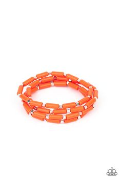 A playful collection of dainty silver cube beads and cylindrical orange/yellow beads are threaded along stretchy bands, creating colorful layers around the wrist. Fun Adjustable Orange Bracelet, Adjustable Orange Wristband Bracelet, Orange Multi-strand Colorful Beads Jewelry, Bohemian Orange Hand-strung Bracelets, Adjustable Nickel-free Orange Bracelets, Retro Bracelet, Yellow Bracelet, Pink Jewels, Orange Bracelet