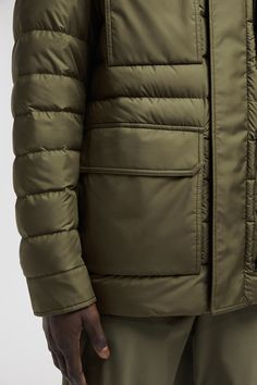 Presenting a fresh vision of menswear, the Fuciade down jacket is crafted from Airsoft - a lightweight nylon fabric notable for its durability and water-repellency. The short puffer is enhanced with a pull-out hood and practical pockets. Modern Nylon Puffer Jacket For Outdoor, Quilted Nylon Parka For Outdoor, Nylon Quilted Jacket With Detachable Hood, Quilted Nylon Jacket With Detachable Hood, Functional Quilted Nylon Outerwear, Long Sleeve Nylon Quilted Jacket With Detachable Hood, Outdoor Quilted Nylon Parka, Utility Nylon Outerwear With Padded Collar, Outdoor Nylon Quilted Jacket With Pockets