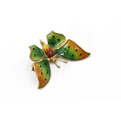 Italian beautifully made three dimensional butterfly brooch decorated in yellow, orange and green enamel.  The pin closure is a c - safety clasp.  The brooch is 18k yellow gold.  It is marked 18k Italy. Handmade Green Enamel Brooches, Multicolor Enamel Brooch Jewelry, Unique Yellow Gold Enamel Brooch, Formal Green Enamel Brooches, Butterfly-shaped Enamel Pin Gift, Green Enamel Brooch As Gift, Butterfly Shaped Enamel Pin For Gifts, Hallmarked Enamel Brooches As Gifts, Luxury Butterfly Brooch As Gift