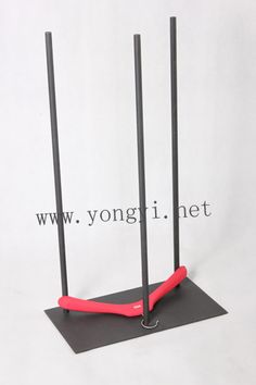 a pair of black poles with red handles