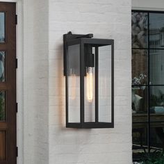 16.5 inch outdoor wall lantern sconce light fixture, it's a contemporary beauty yet functional. Powder-coated black finish. This ambient outdoor sconce lighting is a decorative wall-mounted fixture that provides a beautiful light for entryway, doorway, foyer, corridor, balcony, patio and porch. It features a dusk to dawn auto sensor which enables the fixture to automatically turns on at dusk and turns off at dawn True Fine Spun 1-Light 16.5-in Black Outdoor Wall Light | TD130003OT Front Door Lighting, Wall Mount Lantern, Led Outdoor Wall Lights, Outdoor Sconces, Dusk To Dawn