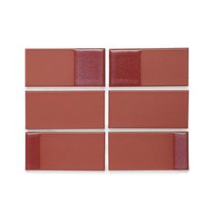 four red brick tiles on a white background