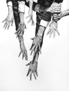 several hands reaching up towards each other