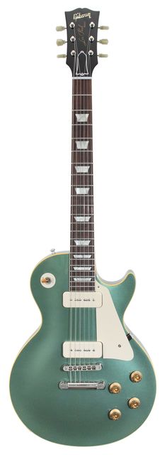 an electric guitar with a green body and white frets on it's neck