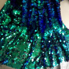 ★MATERIAL polyester fibre,Sequins ★MEASUREMEN Width: 125(cm)/49.21'' ★QUANTITY This listing is for 0.5 meter Green Stretch Mermaid Dress For Party, Blue Sequined Mermaid Dress, Multicolor Mermaid Hem Dress For Party, Multicolor Mermaid Dress For Party, Background Stage, Mermaid Sequin Fabric, Fabric For Dresses, Chinese Fabric, Wedding Shooting