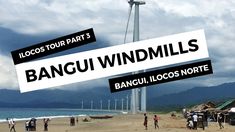 people on the beach with windmills in the background and text reading bangu windmills