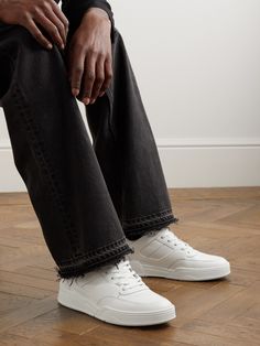 CELINE HOMME's 'CT-07' sneakers are made from white and black leather with durable rubber overlays. Modelled after basketball styles, they're perforated along the toe boxes and sides and finished with signature branded details. Sneakers For Men, White Style, Mr Porter, Sneakers White, Leather Sneakers, Luxury Handbags, Top Sneakers, Fashion News, Calf Skin