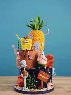 a cake made to look like spongebob and other cartoon characters