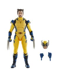 the wolverine action figure is next to his mask and headpieces, which are part of an assortment of toys