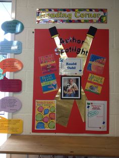 the bulletin board is decorated with colorful papers