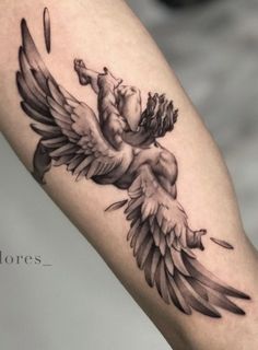 an angel tattoo on the right arm