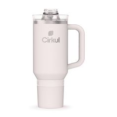 a white coffee mug with the word cirku on it's front and side