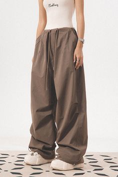 Age: 18-24 years oldSize: M L XLFabric: Other/otherStyle: VersatileWomen's trouser waist height: natural waistColor classification: dark gray light coffee colorSKU: MS2875Year Season: Spring 2023Thickness: RegularClothing style details: StrapsTrouser length: Long pantsWomen's pants type: cargo pantsMaterial composition: 100% of other materials Baggy High Waist Brown Parachute Pants, Baggy Brown Harem Pants With Pockets, Baggy Brown Cargo Pants For Spring, Brown Baggy Parachute Pants For Fall, Brown Baggy High Waist Cargo Pants, Spring Baggy Brown Cargo Pants, Casual Brown Baggy Harem Pants, Brown Harem Pants For Fall, Loosely Fitted Brown Harem Pants For Fall