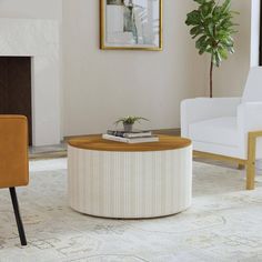 a living room with two chairs and a coffee table in the middle of the room