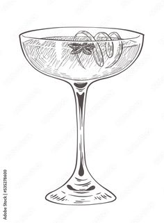 a drawing of a martini glass with olives on the rim and garnish