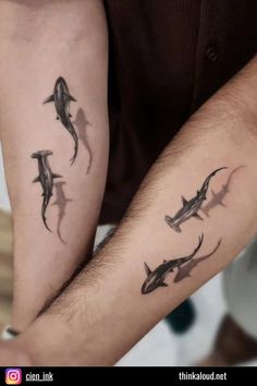 two people with matching tattoos on their arms