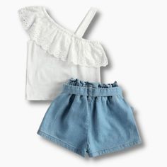 This is such a cool and refreshing outfit for this summer. It features a half off-shoulder with a strap that makes the simple top look very stylish. The detailed lace design will make your little girls stand out in this simple yet stylish outfit. It comes with matching denim shorts. Style it with hat and sandals to complete a summer look. Collar: O-Neck Closure Type: Pullover Model Number: Kid girl outfit Material: Cotton Sleeve Length(cm): Sleeveless Suggested size Suggested Age Top Lenght Bust Simple Top, One Shoulder Top, Shorts Outfit, Girl Standing, Shorts Style, Stylish Outfit, One Shoulder Tops, Lace Design, Summer Looks