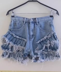 Vintage blue denim shorts with frills in mint condition. Brand: Twotwinstyle Size: M Length: 32 cm Waist: 50 cm Hipps: 86 cm Frills: 9 cm  100 %  Cotton High Waist Ruffled Summer Shorts, High Waist Cotton Ruffle Shorts, Trendy Cotton Ruffle Shorts, Blue Ruffled Short Bottoms, Blue Ruffled Shorts, High Waist Blue Shorts With Ruffles, Blue High-waist Shorts With Ruffles, Blue Denim Ruffled Bottoms, Blue Summer Shorts With Ruffles