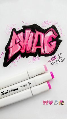 three markers with the word swag written in pink ink on white paper next to it