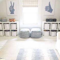 a bedroom with white walls and lots of storage