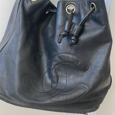 This Is An Authentic Vintage Chanel Bag. It Has Been Worn And Loved And Is In Need Of Tlc. I’ve Posted Photos Of The Wear And Tear But At This Price You Can Bring To Leather Repair Shop Designer Pouch Hobo Bag, Designer Soft Leather Bucket Bag, Vintage Chanel Bag, Vintage Bucket, Leather Repair, Chanel Vintage, Repair Shop, Chanel Bags, Vintage Chanel