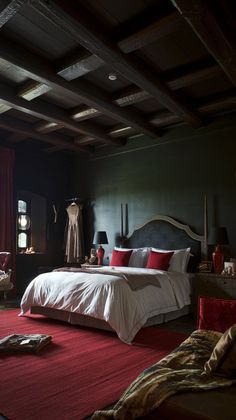 a bedroom with a large bed and red carpet