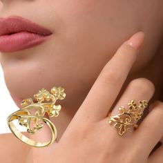 "This exquisite Art nouveau 14 Gold Plated Silver floral Ring for Women is a stunning piece that effortlessly combines elegance and sophistication. Crafted with meticulous attention to detail, this ring showcases a beautiful blend of silver and gold, creating a captivating contrast that will instantly catch the eye. The gold adds a touch of luxury and brilliance to the overall design, making it the perfect accessory for any occasion. Designed especially for women, this ring features a sleek and feminine silhouette that beautifully wraps around the finger, enhancing its natural beauty. The combination of silver and gold creates a versatile piece that can be easily paired with both casual and formal outfits, adding a touch of refined glamour to any ensemble. Made with high-quality materials, Elegant Open Flower Ring For Anniversary, Elegant Flower-shaped Rings For Gifts, Elegant Yellow Gold Flower Ring With Intricate Design, Elegant Gold Flower Ring With Intricate Design, Elegant Flower Ring With Intricate Design As Gift, Elegant Yellow Gold Open Flower Ring, Elegant Formal Flower Ring With Intricate Design, Elegant Flower Ring Hallmarked, Fleurs Art Nouveau