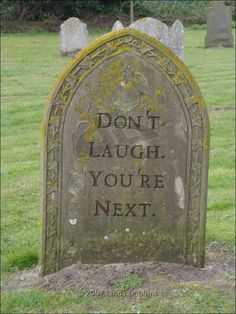 a grave with the words don't laugh, you're next written on it