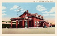 an old postcard shows a red building with white trim on the front and side