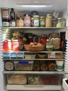 an open refrigerator filled with lots of food