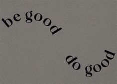 the word be good written in black ink on a gray surface with an inscription below it