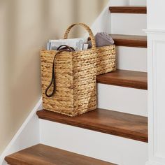 a basket sitting on top of some stairs