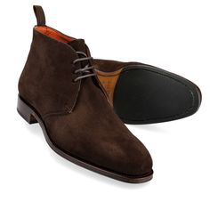 CHUKKA BOOTS IN BROWN SUEDE Formal Boots With Vibram Sole And Almond Toe, Formal Almond Toe Boots With Vibram Sole, Business Lace-up Boots With Suede Lining, Business Boots With Vibram Sole And Snip Toe, Winter Business Boots With Vibram Sole, Luxury High-top Formal Boots, Luxury High-top Boots For Formal Occasions, Classic High-top Boots With Suede Lining, Elegant Ankle Boots With Vibram Sole