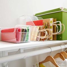 the shelves are filled with many different colored bags