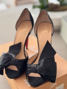 Authentic- Christian Louboitin Dorcet satin pumps SZ39 Gently Used beautiful crepe satin pupm with bow. In original box and dustbag. Womens Pumps, Satin Pumps, Women's Pumps, Original Box, Dust Bag, Pumps, Ships, Satin, Women Shoes