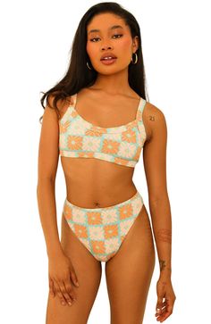 The KELLY TOP is the perfect way to stay chill and stylish when you hit the beach. This bikini top's comfortable design will keep you feeling great as you soak up those rays! Look hot and stay cool with the KELLY TOP! 82% Polyester 18% Spandex Imported from Vietnam Wide adjustable straps All around bandeau style Seamless Tankini For Vacation And Beach Season, Summer Seamless Beach Top, Seamless Beachwear Tops For Beach, Summer Seamless Tops For The Beach, Trendy Bra Friendly Swimwear For Vacation, Seamless Summer Beach Top, Casual Seamless Swimwear For Beach Season, Trendy Bra-friendly Swimwear For Vacation, Bra Friendly Tops For Poolside And Beach Season