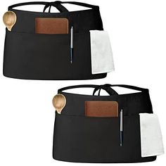 two black and white bags with brown leather handles, one has a pocket on the side