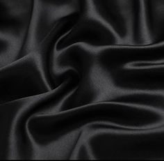 INFORMATION: This beautiful Stretch Charmeuse Sayin Fabric has a beautiful smooth shiny satin side with a modest matte finish on the back. The fabric is tightly woven and has a light 2-way vertical stretch, making it extremely durable. In addition, our stretch charmeuse is approximately 7 ounces per linear yard which is a better construction than most standard stretch charmeuse fabrics. This heavier gsm (grams per square meter) gives the fabric a richer feeling and a better hold when draping. Th Black Satin Fabric, Satin Noir, Silk Satin Fabric, Silk Pillowcase, Silk Charmeuse, Stretch Satin, Tall Model, Mulberry Silk, Pure Color