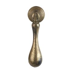 an antique brass door handle on a white background