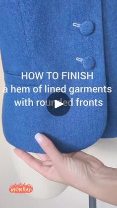 a woman's hand holding onto a blue jacket with the words how to finish a hem of lined garments with rounded fronts